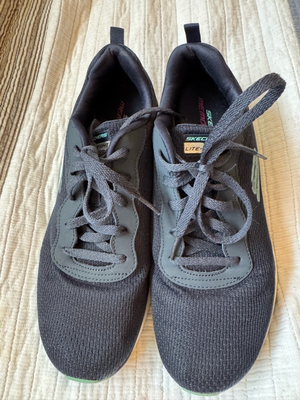 Skechers Men’s Black Knit Lace-Up Sneakers with Subtle Green Accent
